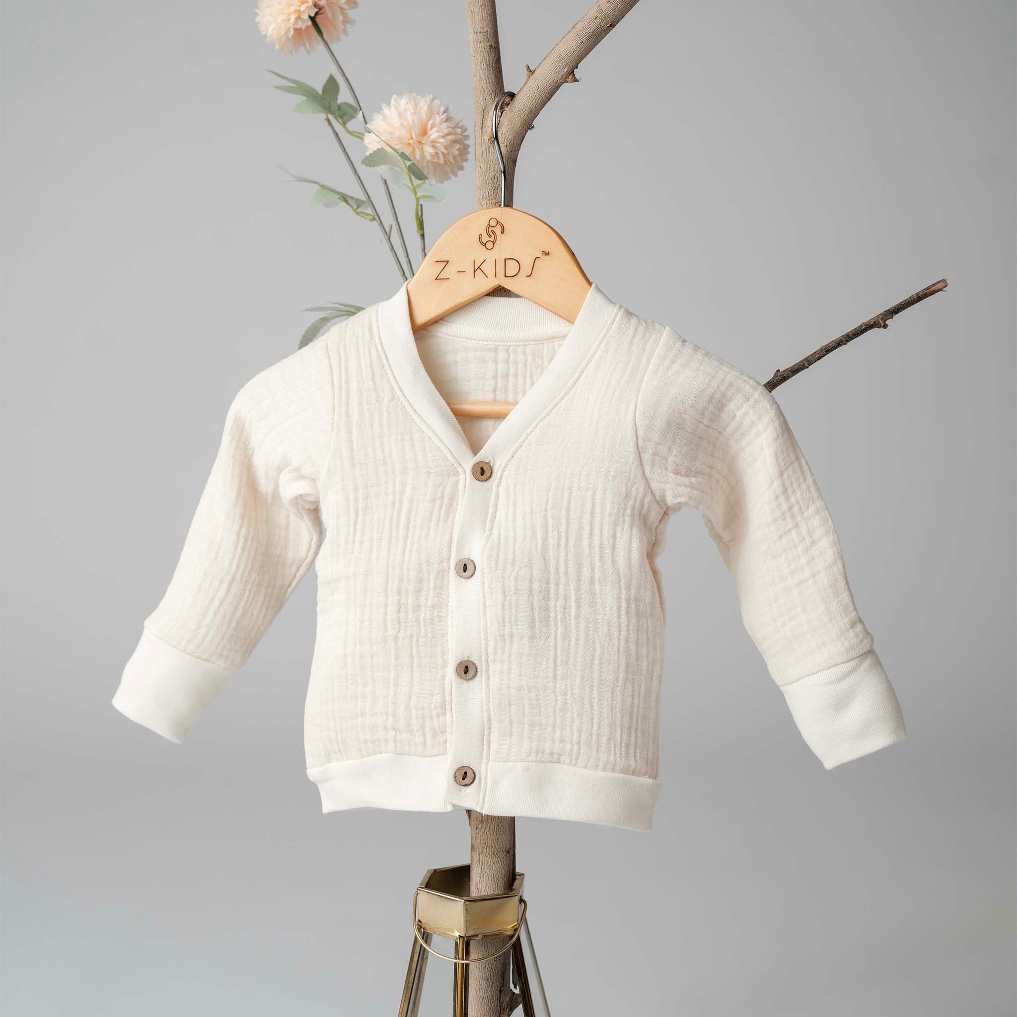 Gentle baby sweater crafted from double-layer organic muslin for ultimate softness and breathability